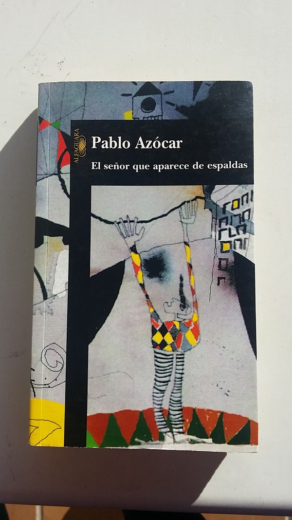 El señor que aparece de espaldas